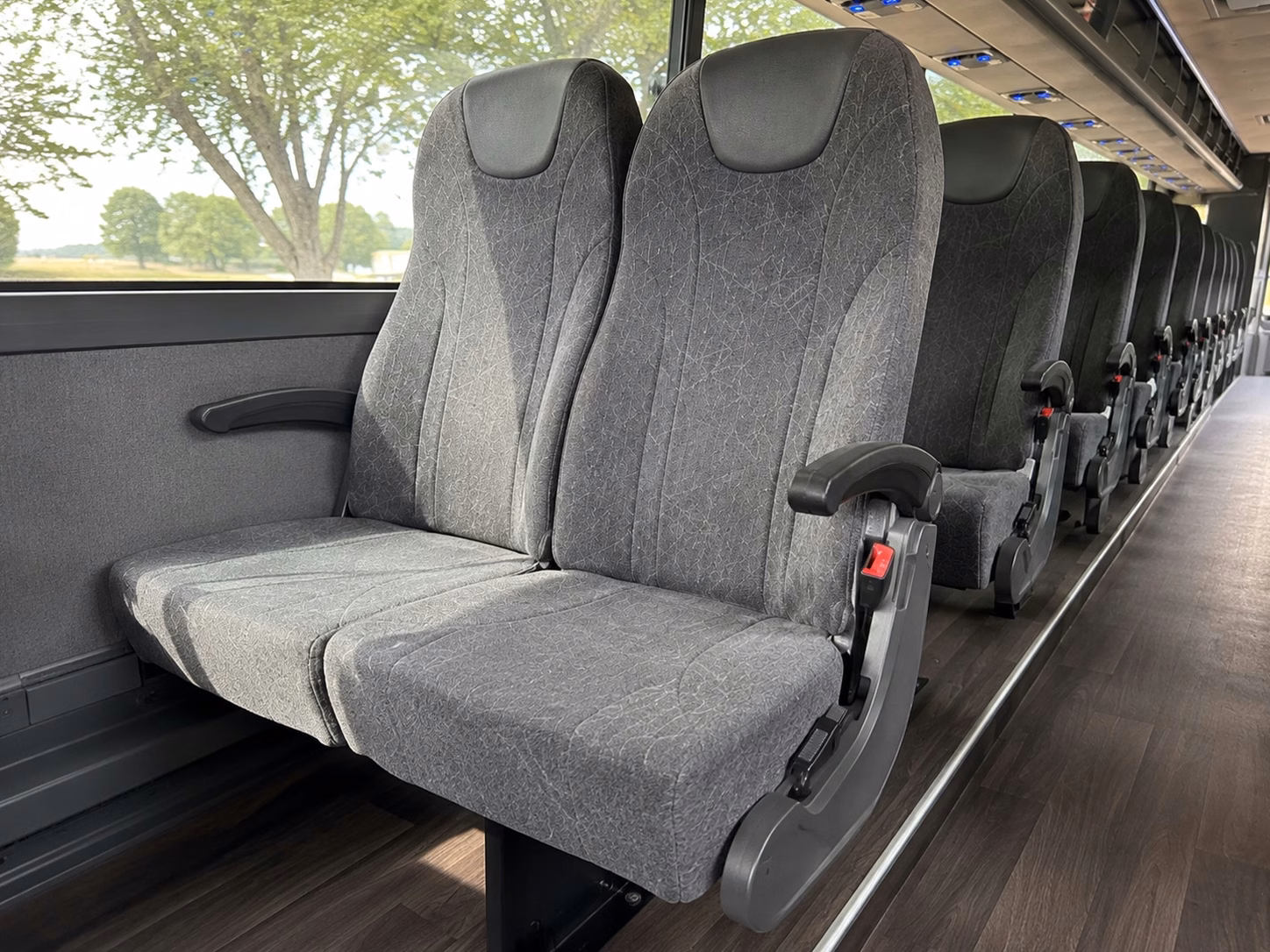 how trip distance and duration affect charter bus rates in overland park